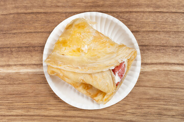 top view shredded pancake with bacon