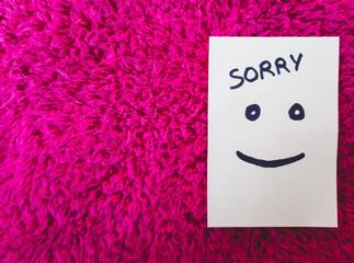 Sorry on sticky Note on fur texture background - Sorry Tag - Sorry Background