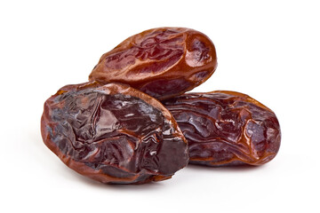 Raw Organic Medjool Dates, isolated on white background.