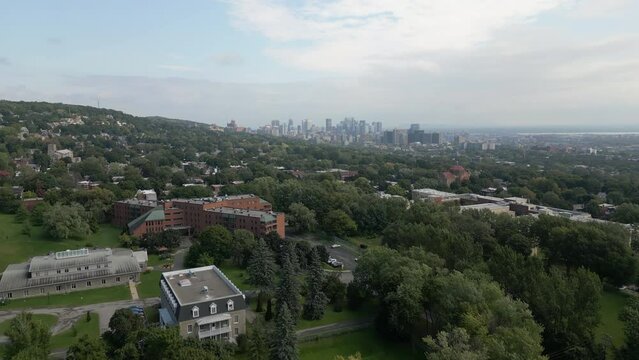 Aerial view of downtown Montreal over Westmount and Mont-Royal mountain during summer
