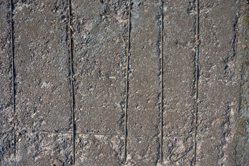Close-up of concrete slabs with metal