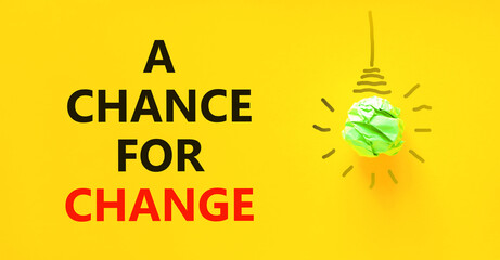 A chance for change symbol. Concept words A chance for change on beautiful yellow paper. Beautiful yellow background. Green light bulb icon. Business chance for change concept. Copy space