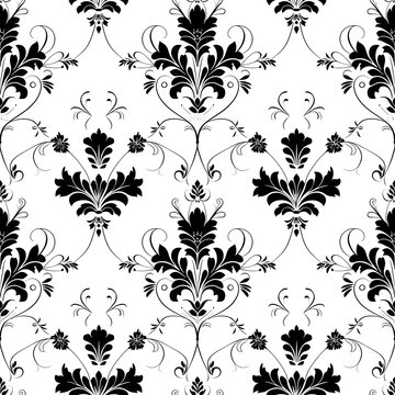 A black and white filigree pattern with intricate designs.