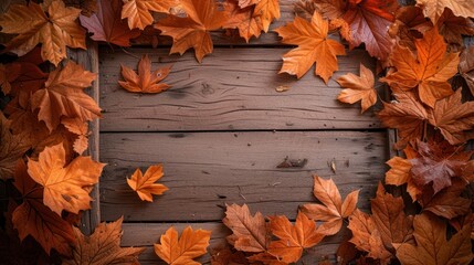 Naklejka na ściany i meble Seasonal autumn leaves frame with a vintage wood board center.