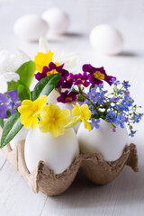 Easter centerpiece of flowers and eggshells