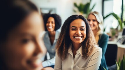 Fototapeta premium A group of diverse, confident, women working together, smiling, in an office, business environment