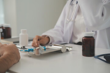 Healthcare service and pharmacy worker with customer at store counter for medication explanation. Pharmaceutical advice and opinion of pharmacist helping girl with medicine information.
