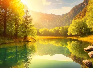Foto op Canvas Picturesque landscape with green trees and a lake on a sunny afternoon © D'Arcangelo Stock