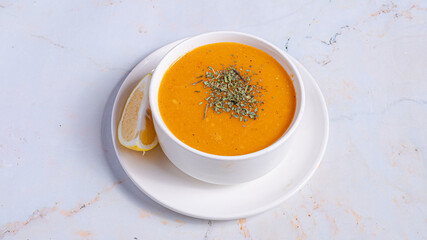 Lentil soup bowl isolated on white