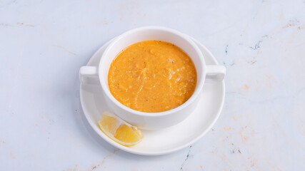 Lentil soup bowl isolated on white