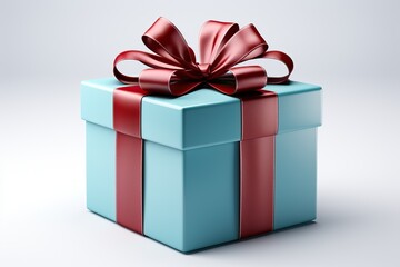 Obraz premium The gift is wrapped in blue paper and tied with a red ribbon.