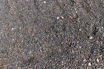 a pedestrian walkway in the park made of rubble and stones