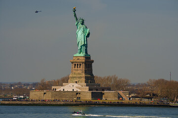 Fototapeta premium The Statue of Liberty - New york cityscape river side which location is lower manhattan. Architecture and building with tourist concept.