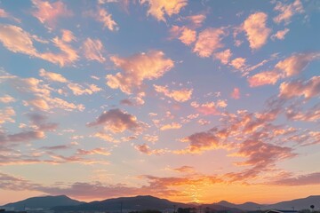 A captivating sunset paints the sky with orange hues over distant mountains. Tranquil and dramatic...