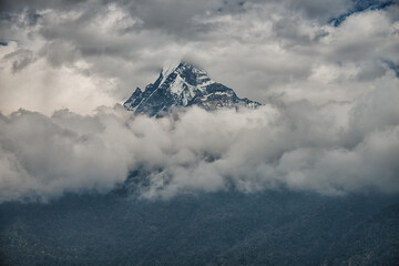 Majestic Machapuchare Peak Emerging from Clouds on Poon Hill Trek, Nepal