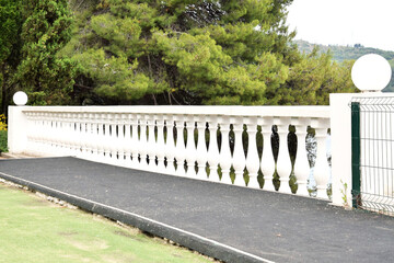 Spain. Marble railings with balusters in a city park