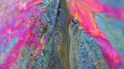 Ink background. Glitter paint. Color fluid mix. Captivating hypnotic macro abstract design pink...