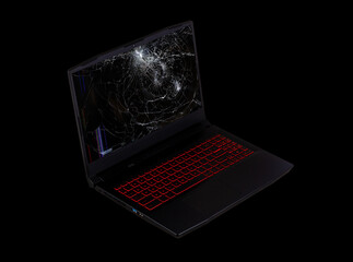 open laptop on broken screen isolated on black background