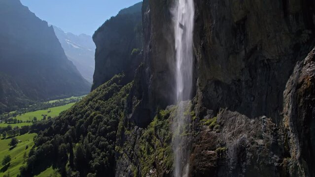 Flight near Staubbach Fall (Staubbachfall) waterfall in Lauterbrunnen, Switzerland