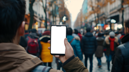 a curious tourist stands clutching a smartphone with a blank, white screen in a foreign city 
