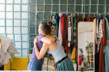 seamstress and client say goodbye