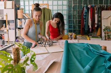 two seamstress students at the table