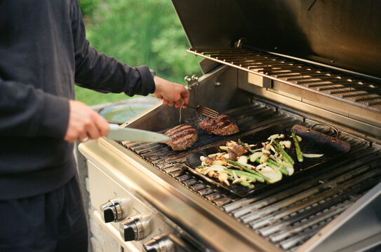 male Grilling Barbecue film photo