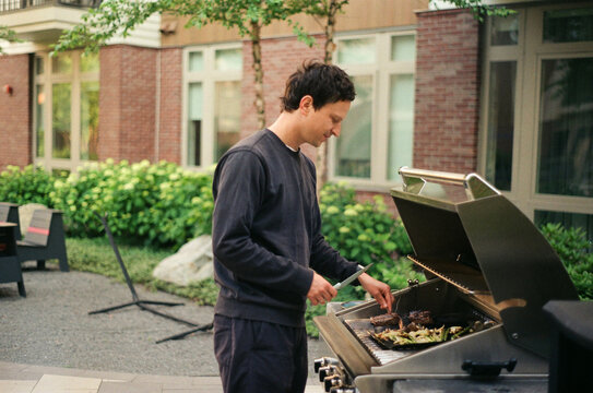 male Grilling Barbecue film photo