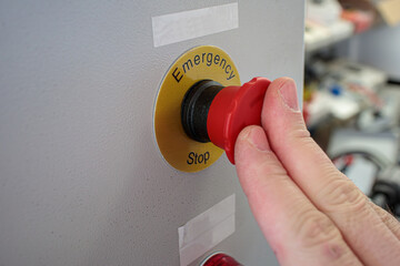 close up of a hand holding a switch