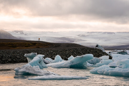 Icy lagoon with floating iceberg and glacier. Natural arctic landscape