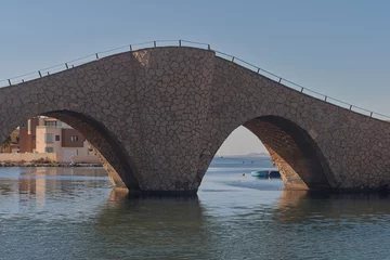 Photo sur Plexiglas Pont du Rialto Stone bridge over water