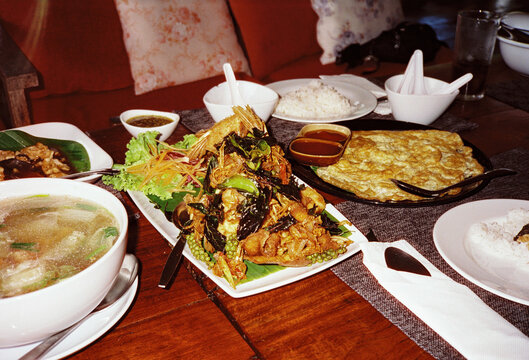 Authentic Thai meal of Thai omlette and fried King Fish.