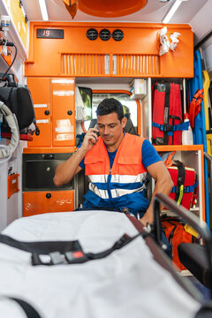 portrait of a paramedic talking on the phone