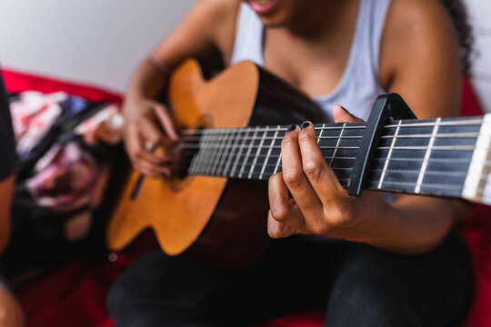 Playing guitar