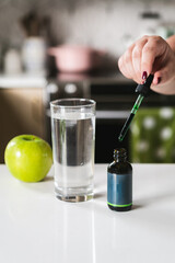 Chlorophyll supplement styled with plants