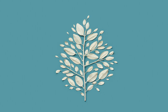 Composition of branches and leaves painted in silver color