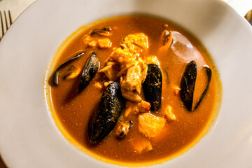red seafood fish soup in Rovinj Croatia real life restaurant foto