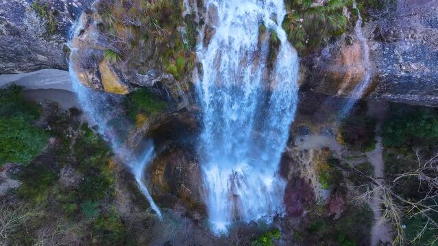 La Mea waterfall seen from a drone. Between Quintanilla Valdebodres and Puentedey in the area of the Canales del Dulla. The Merindades. Burgos. Spain. Europe