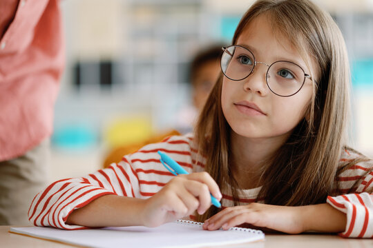 Student eyewear workplace jot down  attention study hard school lesson