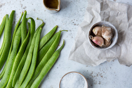 Freshly harvested runner beans and garlic