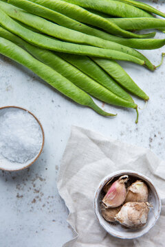 Freshly harvested runner beans and garlic