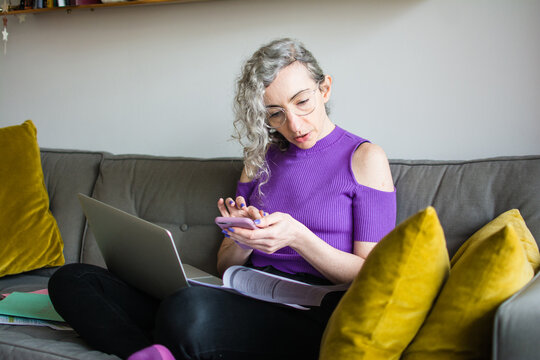 Woman checking credit card statements