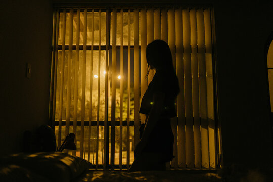 Silhouette and City Lights