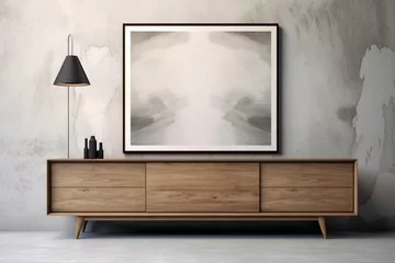 Fototapeten Imagine a modern interior design with a wooden cabinet and dresser against a textured concrete backdrop. A blank poster frame presents an opportunity for your artistic flair. © Hamzaa