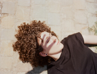 A curly woman portrait