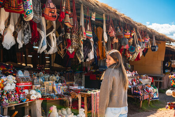 Woman in a handicraft shop in Cusco Peru