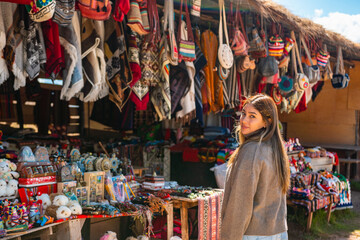 Woman in a handicraft shop in Cusco Peru. Tourism South America