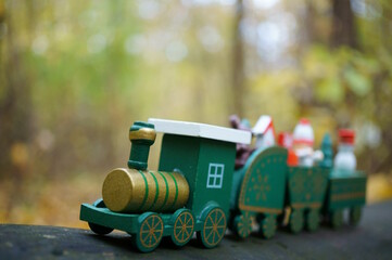 A toy Christmas train with toys. New Year decorations.