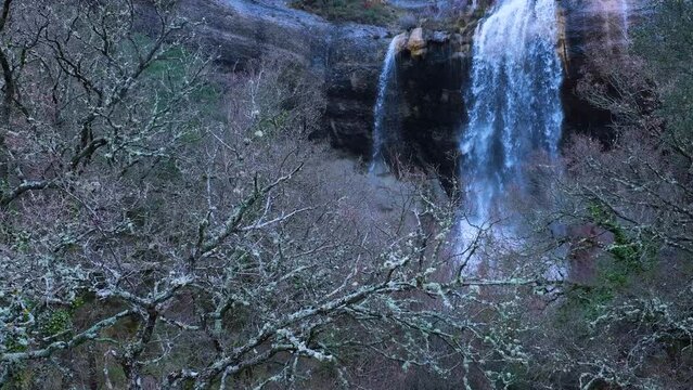 La Mea waterfall seen from a drone. Between Quintanilla Valdebodres and Puentedey in the area of the Canales del Dulla. The Merindades. Burgos. Spain. Europe