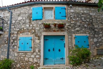 beautiful street of Rovinj Croatia with cobblestone and colorful shutters